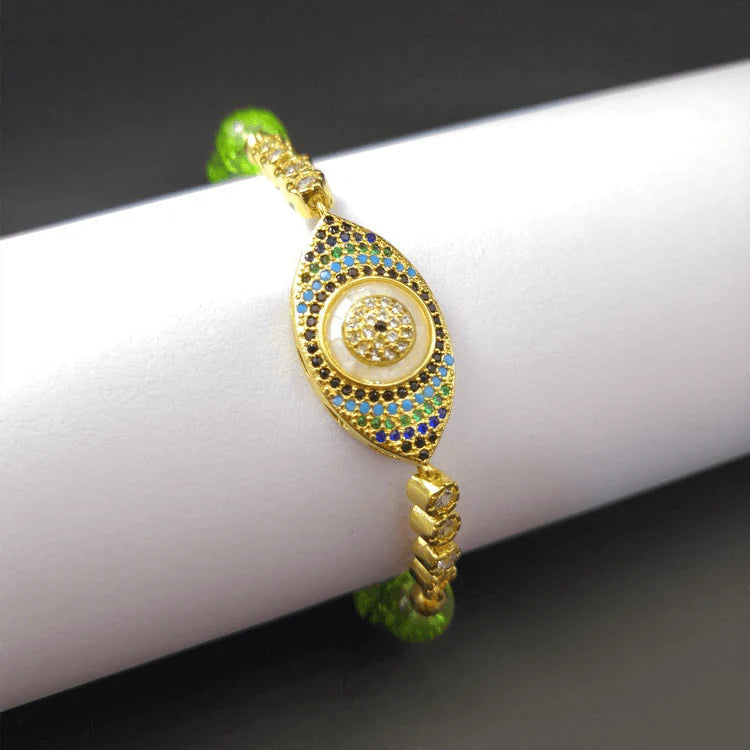 Peridot-Accented Evil Eye Bracelet - A Blend of Style and Protection