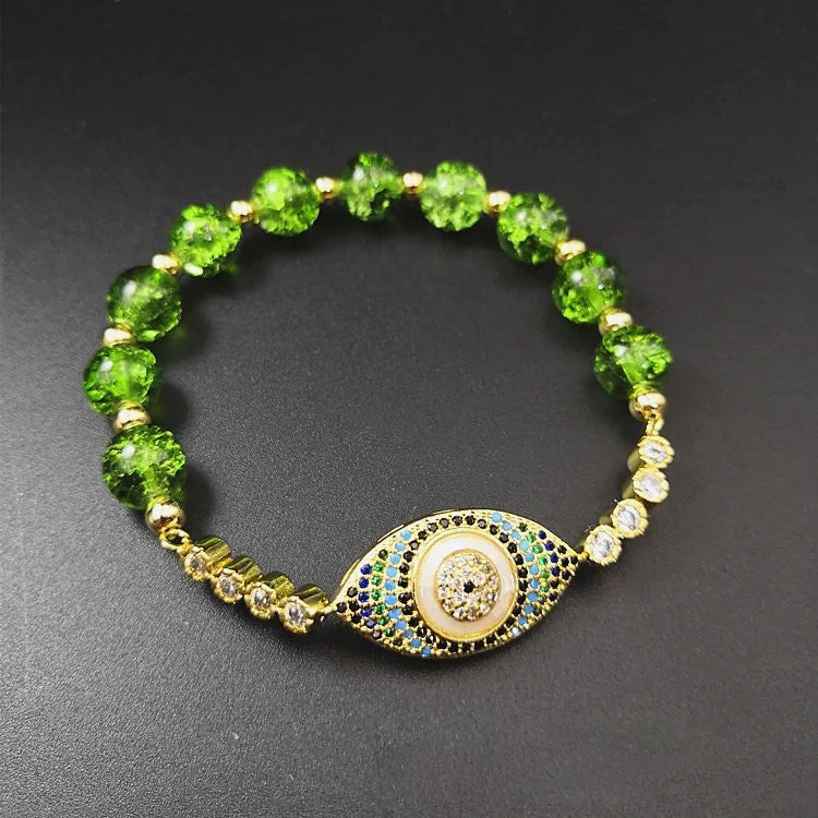 Peridot-Accented Evil Eye Bracelet - A Blend of Style and Protection